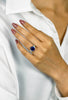 5.29 Carats Oval Cut Blue Sapphire and Diamond Three-Stone Engagement Ring in Platinum