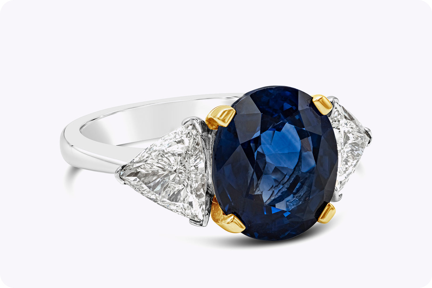 GIA Certified 5.28 Carats Oval Cut Blue Sapphire & Diamond Three-Stone Engagement Ring in Yellow Gold & Platinum