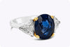 GIA Certified 5.28 Carats Oval Cut Blue Sapphire with Diamonds Three-Stone Engagement Ring in Platinum