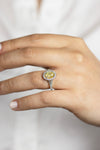 GIA Certified 1.69 Carats Oval Cut Fancy Yellow Diamond Halo Engagement Ring in White Gold & Platinum