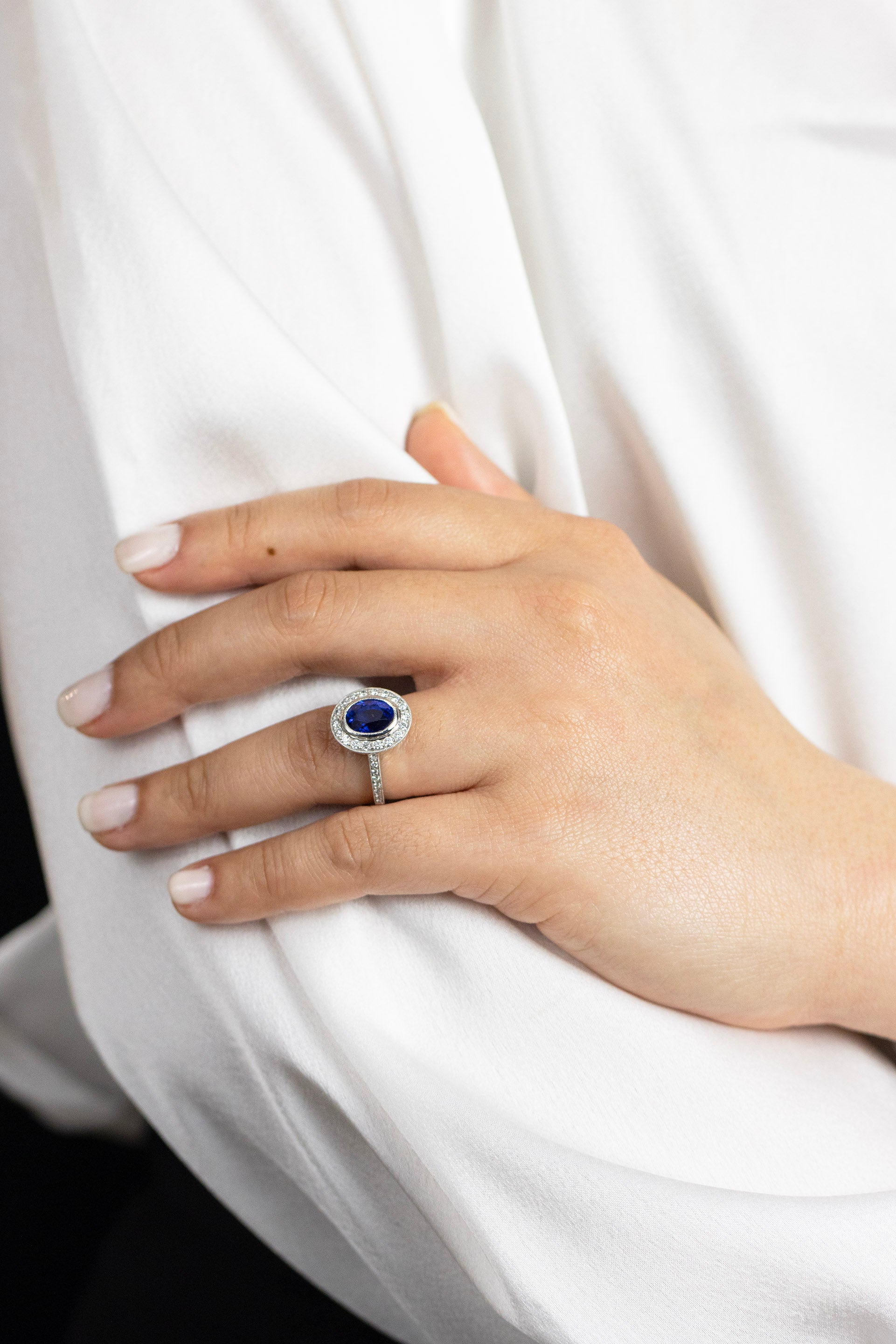 3.60 Carats Oval Cut Sapphire & Diamond Halo Engagement Ring in Platinum