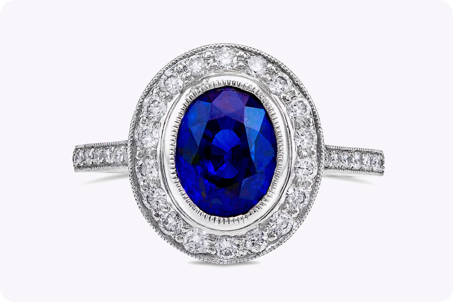 3.60 Carats Oval Cut Sapphire & Diamond Halo Engagement Ring in Platinum