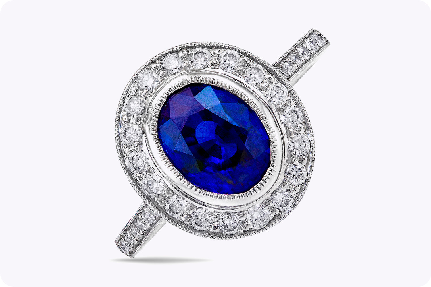 3.60 Carats Oval Cut Sapphire & Diamond Halo Engagement Ring in Platinum