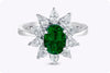 1.48 Carats Oval Cut Emerald & Diamond Halo Floral Engagement Ring in White Gold