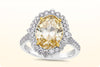 GIA Certified 3.39 Carats Oval Cut Fancy Intense Yellow Diamond Halo Engagement Ring in Yellow Gold & Platinum