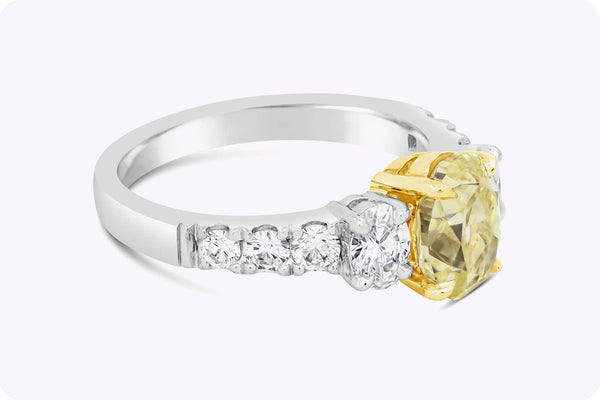 GIA Certified 1.53 Carats Oval Cut Yellow Diamond Three-Stone Engagement Ring in White Gold