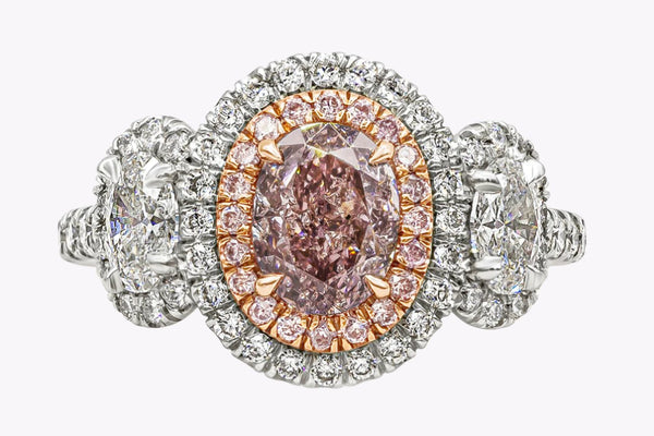 GIA Certified 1.00 Carat Oval Cut Pink Diamond Three-Stone Engagement Ring in Platinum