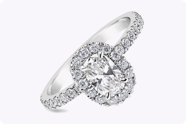 0.60 Carat Oval Cut Diamond Halo Engagement Ring in Platinum