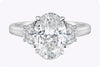 3.23 Carats Oval Cut Diamond Three Stone Engagement Ring in Platinum