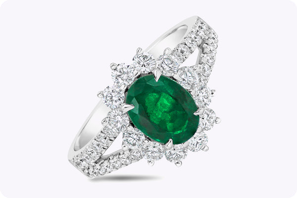 1.17 Carats Oval Cut Emerald & Diamond Halo Floral Engagement Ring in White Gold