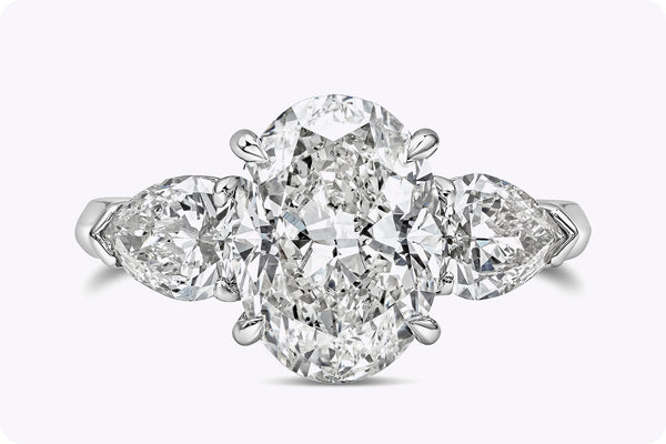 GIA Certified 3.02 Carats Oval Cut Diamond Three-Stone Engagement Ring in Platinum