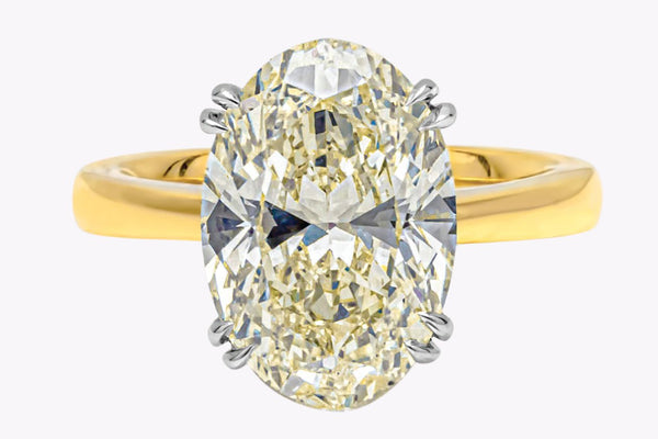 GIA Certified 5.47 Carats Oval Cut Diamond Solitaire Engagement Ring in Yellow Gold & Platinum