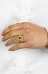 GIA Certified 6.64 Carats Oval Cut Orange Sapphire and Marquise Cut Diamond Halo Ring in Yellow Gold and Platinum