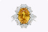 GIA Certified 6.64 Carats Oval Cut Orange Sapphire with Diamond Halo Ring in Platinum