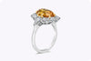 GIA Certified 6.64 Carats Oval Cut Orange Sapphire and Marquise Cut Diamond Halo Ring in Yellow Gold and Platinum