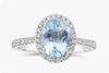 1.69 Carats Oval Cut Blue Aquamarine & Diamond Halo Engagement Ring in White Gold