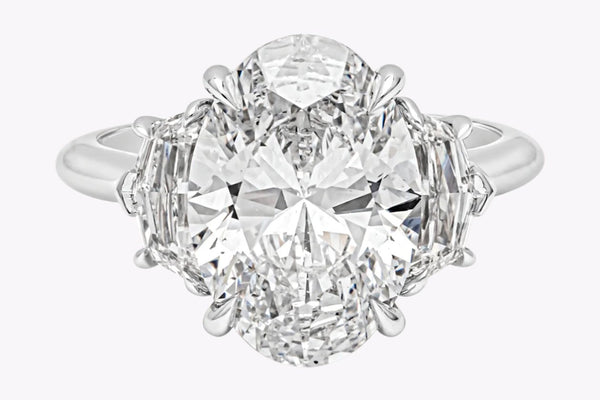 GIA Certified 5.11 Carats Oval Cut Diamond Three-Stone Engagement Ring in Platinum