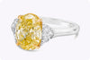 GIA Certified 4.12 Carats Oval Cut Fancy Intense Yellow Diamond Three-Engagement Ring in Yellow Gold and Platinum