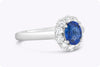 0.94 Carat Oval Cut Sapphire & Diamond Halo Engagement Ring in White Gold