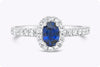 0.56 Carat Oval Cut Sapphire & Diamond Halo Engagement Ring in White Gold