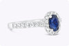 0.56 Carat Oval Cut Sapphire & Diamond Halo Engagement Ring in White Gold