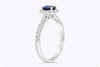 0.56 Carat Oval Cut Sapphire & Diamond Halo Engagement Ring in White Gold