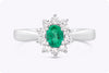 0.40 Carat Oval Cut Emerald & Diamond Halo Engagement Ring in White Gold