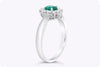 0.40 Carat Oval Cut Emerald & Diamond Halo Engagement Ring in White Gold