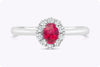 0.53 Carat Oval Cut Ruby & Diamond Halo Engagement Ring in White Gold