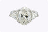 GIA Certified 4.61 Carats Total Oval Cut Diamond Three-Stone Engagement Ring in White Gold