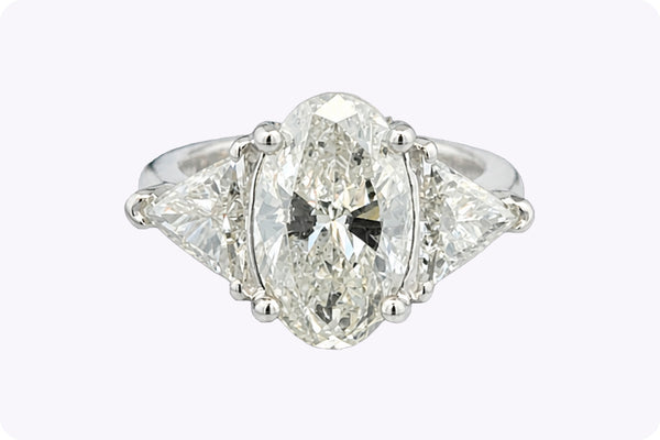 GIA Certified 4.61 Carats Total Oval Cut Diamond Three-Stone Engagement Ring in White Gold