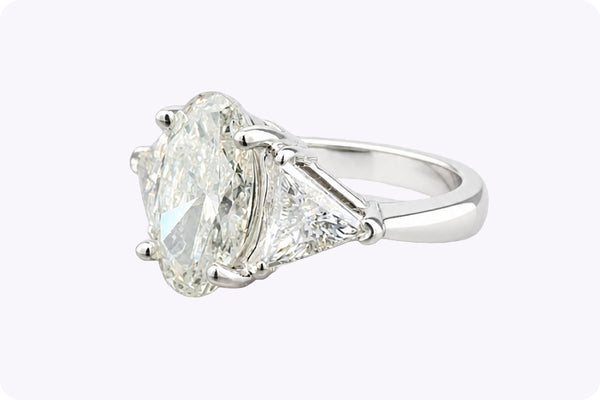 GIA Certified 4.61 Carats Total Oval Cut Diamond Three-Stone Engagement Ring in White Gold
