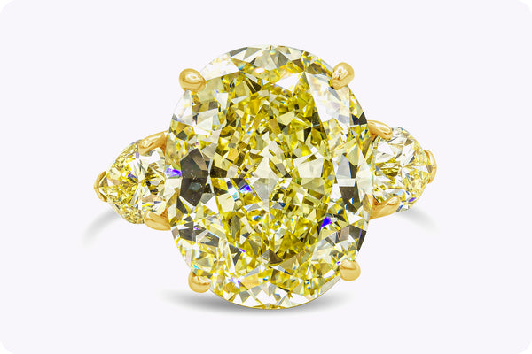 Cartier GIA Certified 13.46 Carats Oval Cut Yellow Diamond Three-Stone Engagement Ring in Yellow Gold