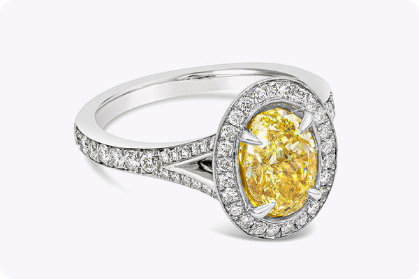 GIA Certified 1.76 Carats Oval Cut Yellow Diamond Halo Engagement Ring in Platinum