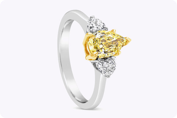 1.09 Carats Pear Shape Yellow Diamond Three-Stone Engagement Ring in White & Yellow Gold