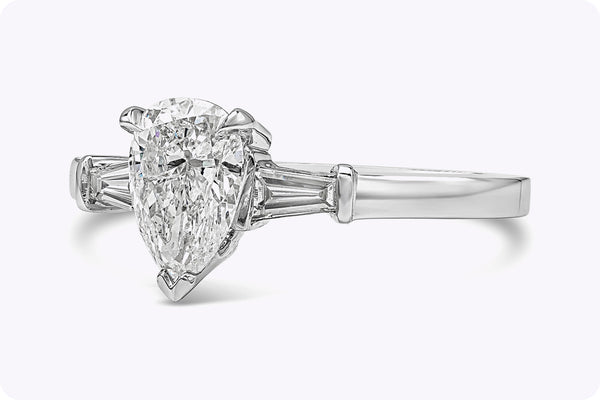 1.01 Carats Pear Shape Diamond Three-Stone Engagement Ring in White Gold