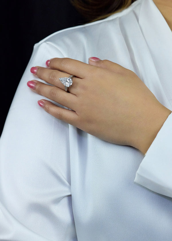 GIA Certified 5.01 Carat Pear-Shaped Diamond Three-Stone Engagement Ring in Platinum