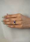 2.05 Carat Round Blue Sapphire and Diamond Three-Stone Engagement Ring in Yellow Gold