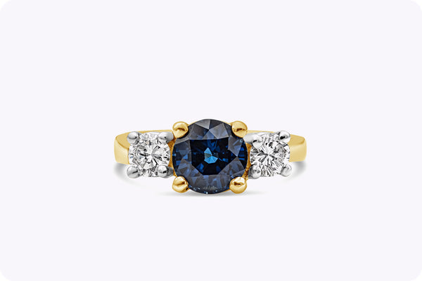 2.05 Carat Round Blue Sapphire and Diamond Three-Stone Engagement Ring in Yellow Gold