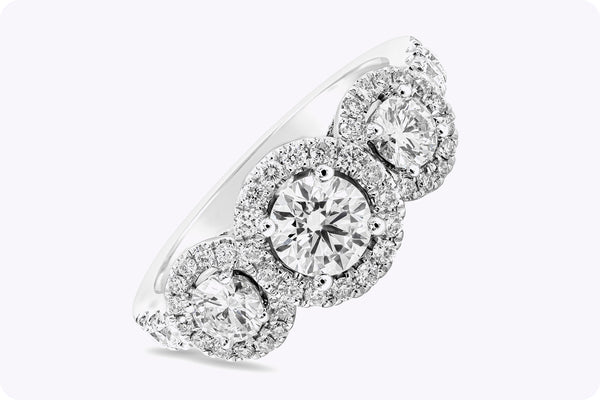 1.40 Carats Total Round Brilliant Cut Diamond Three-Stone Halo Engagement Ring in White Gold