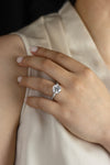 4.53 Carats Brilliant Round and Baguette Diamond Three Stone Engagement Ring in White Gold