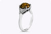 GIA Certified 3.04 Carat Orangey Brown Diamond Three-Stone Engagement Ring in Platinum