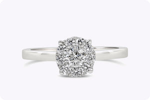 Diamond cluster solitaire engagement ring