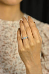 Classic diamond solitaire engagement ring worn