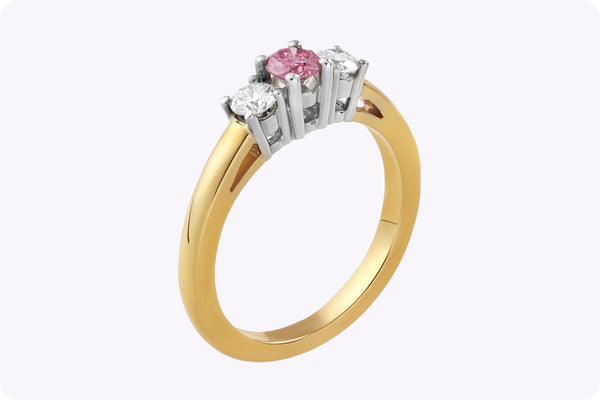 GIA Certified 0.23 Carat Round Cut Argyle Pink Diamond Three-Stone Important Engagement Ring in 18k Two-Tone Gold