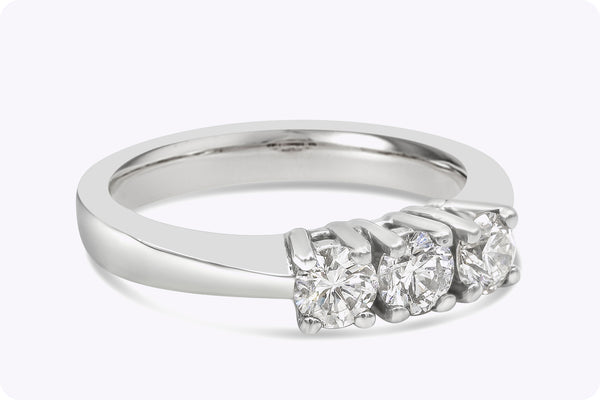 0.72 Carat Total Round Brilliant Cut Diamond Three-Stone Engagement Ring in Platinum