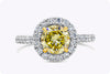 GIA Certified 1.51 Carats Brilliant Round Fancy Intense Yellow Diamond Halo Pave Engagement Ring in White Gold