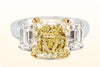 GIA Certified 4.68 Carats Intense Yellow Diamond Three-Stone Engagement Ring in Yellow Gold & Platinum