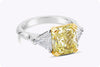 GIA Certified 4.06 Carats Radiant Cut Fancy Yellow Diamond Three-Stone Engagement Ring in Yellow Gold and Platinum