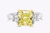 GIA Certified 3.31 Carats Radiant Cut Fancy Yellow Diamond Three-Stone Engagement Ring in Yellow Gold and Platinum